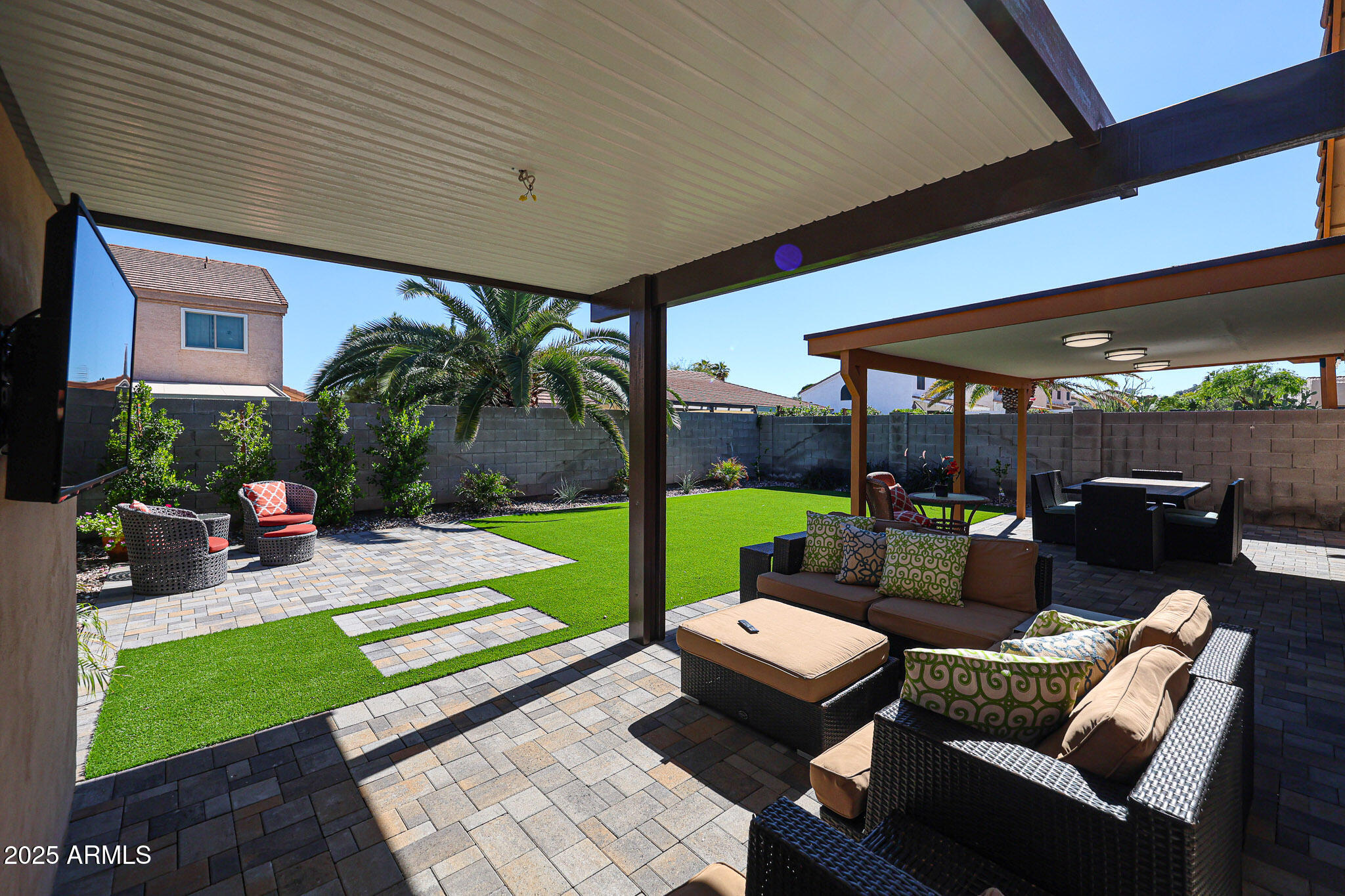 20007 North 20th Way Phoenix, AZ 85024 - Photo 25 of 30 a view of a patio with couches chairs and a yard