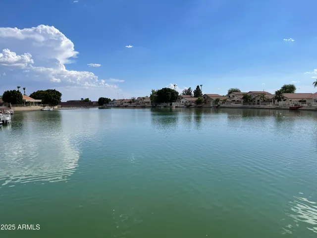 a view of a lake with houses