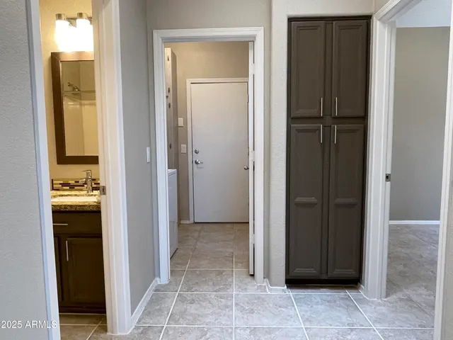 a bathroom with a shower and a bath tub