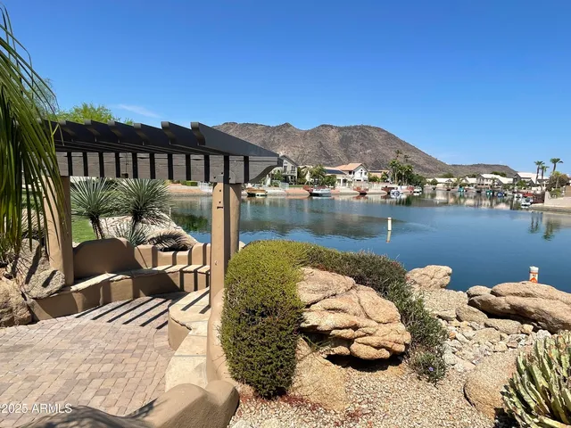 a view of a lake with a big yard