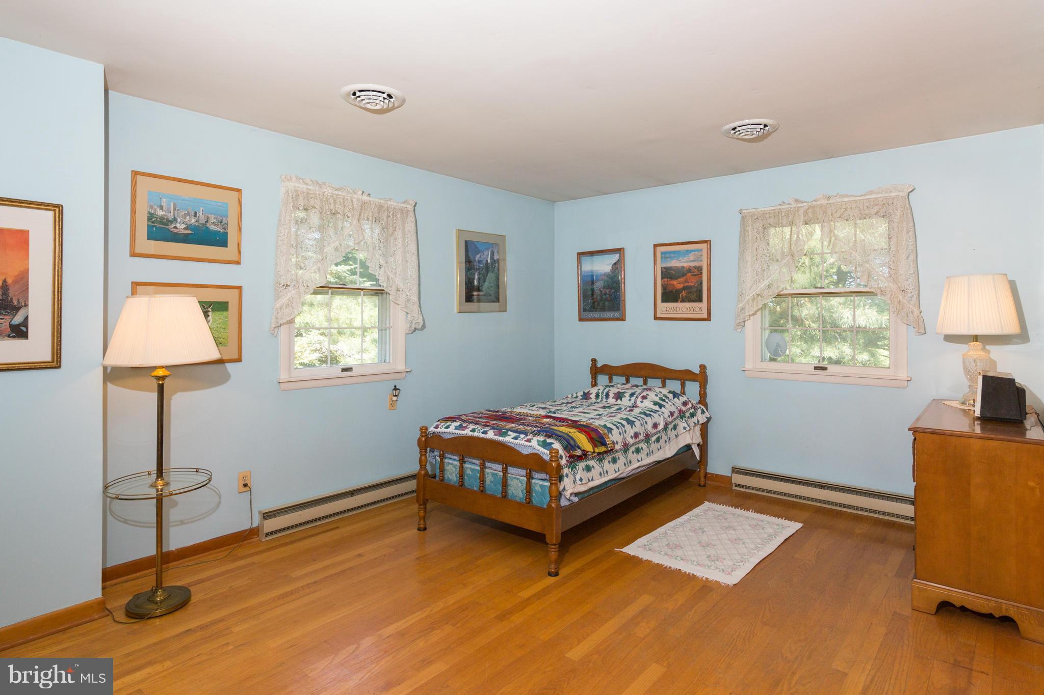 7227 Morgan Road Woodbine, MD 21797 - Photo 12 of 29 a bedroom with a bed and a window