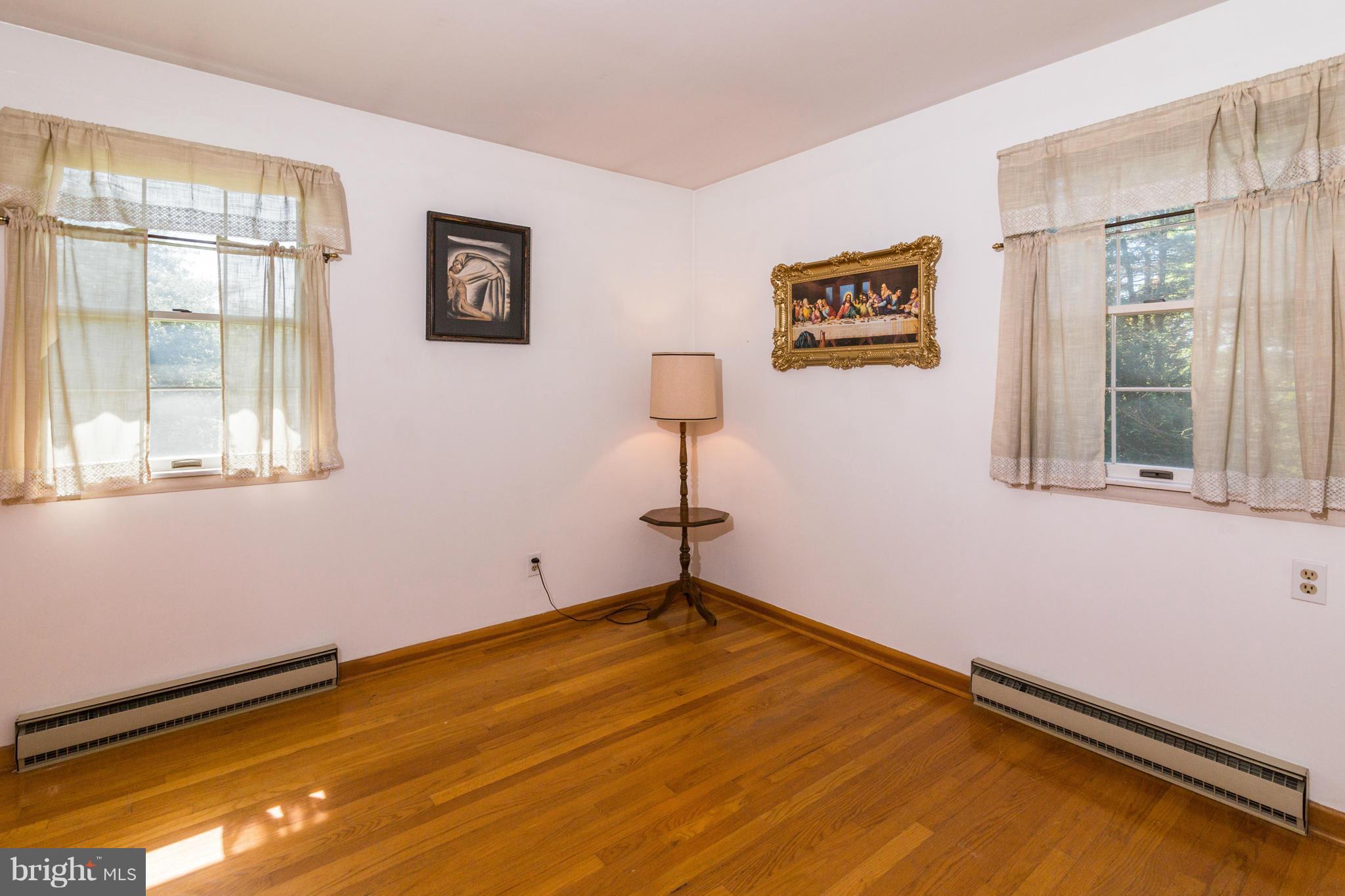 7227 Morgan Road Woodbine, MD 21797 - Photo 14 of 29 a view of a room with wooden floor and windows