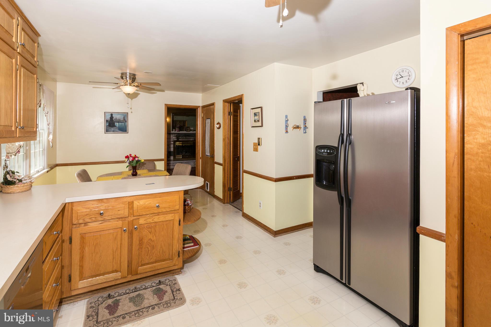 7227 Morgan Road Woodbine, MD 21797 - Photo 3 of 29 a kitchen with stainless steel appliances a refrigerator and a sink
