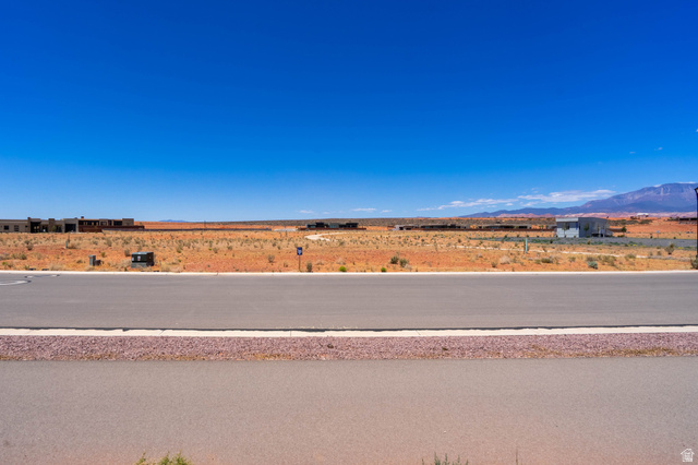 3306 South Endless Trail, Unit 33 Hurricane, UT 84737 - Photo 4 of 27 Paved road frontage with a gravel shoulder