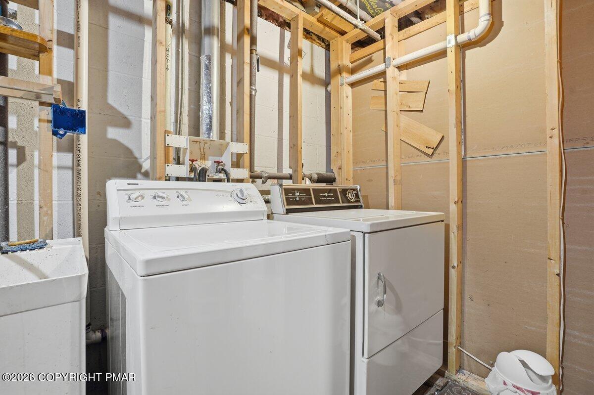 3116 Woodland Court Bushkill, PA 18324 - Photo 22 of 72 a utility room with dryer and washer