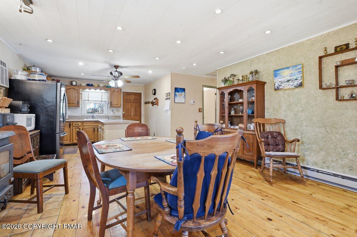 3116 Woodland Court Bushkill, PA 18324 - Photo 29 of 72 a view of a dining room with furniture