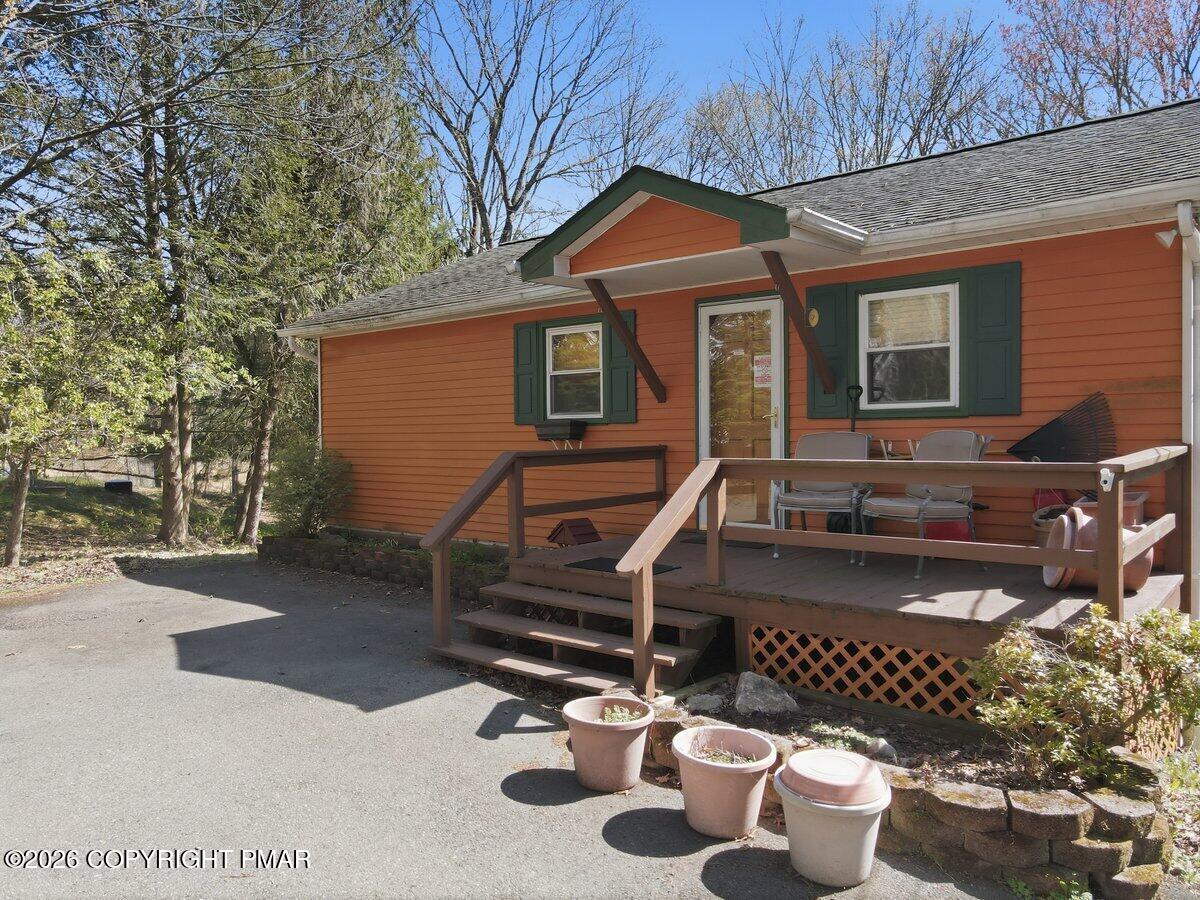 3116 Woodland Court Bushkill, PA 18324 - Photo 44 of 72 a front view of a house with sitting area