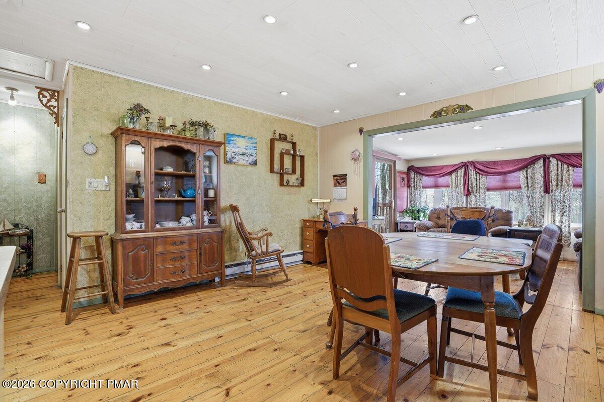 3116 Woodland Court Bushkill, PA 18324 - Photo 5 of 72 a view of a dining room with furniture