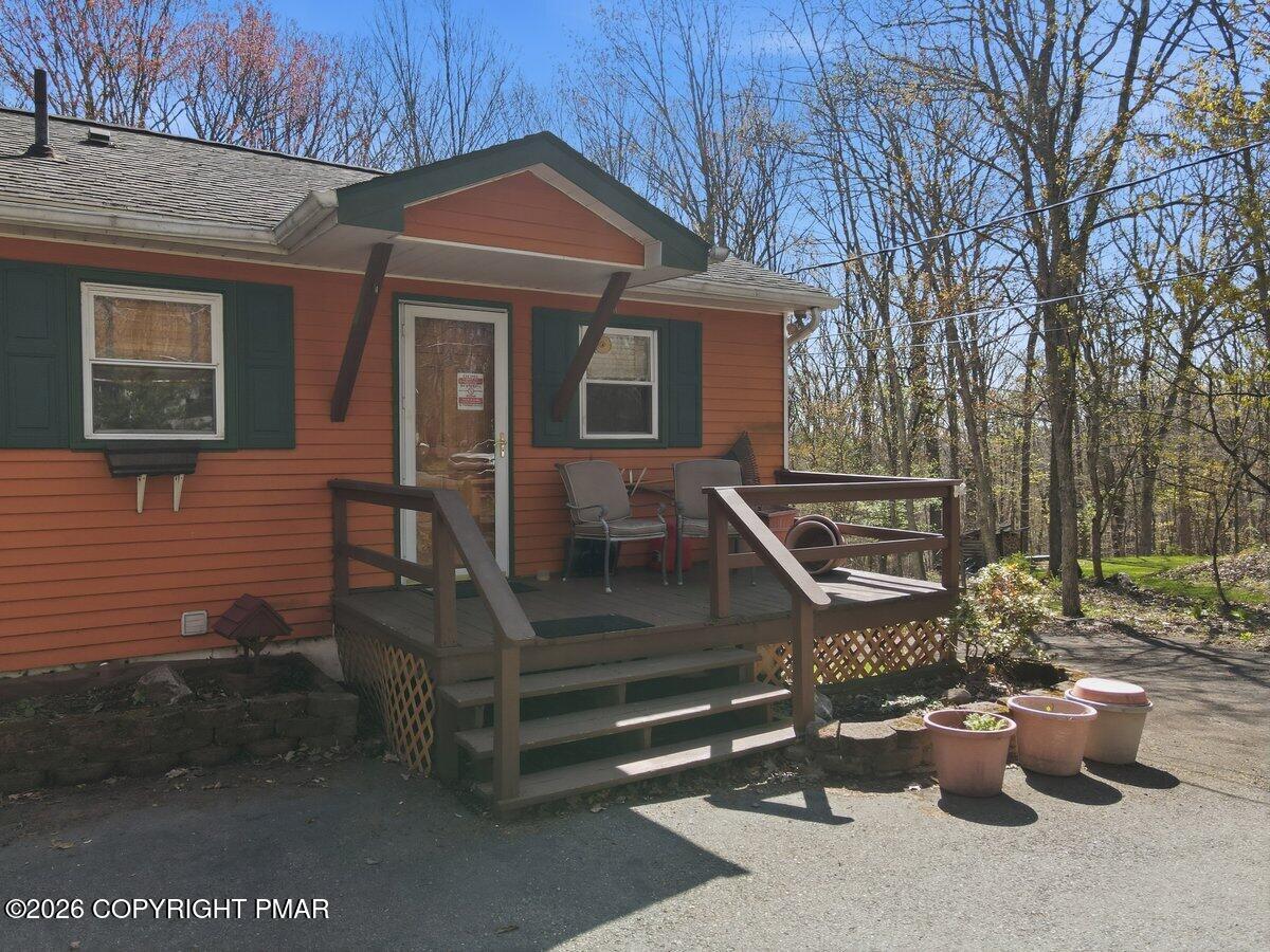3116 Woodland Court Bushkill, PA 18324 - Photo 60 of 72 a view of a patio with chairs and tables