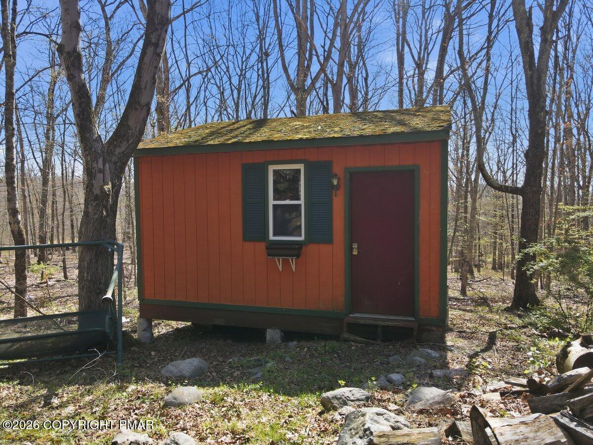 3116 Woodland Court Bushkill, PA 18324 - Photo 63 of 72 a view of a house with a tree