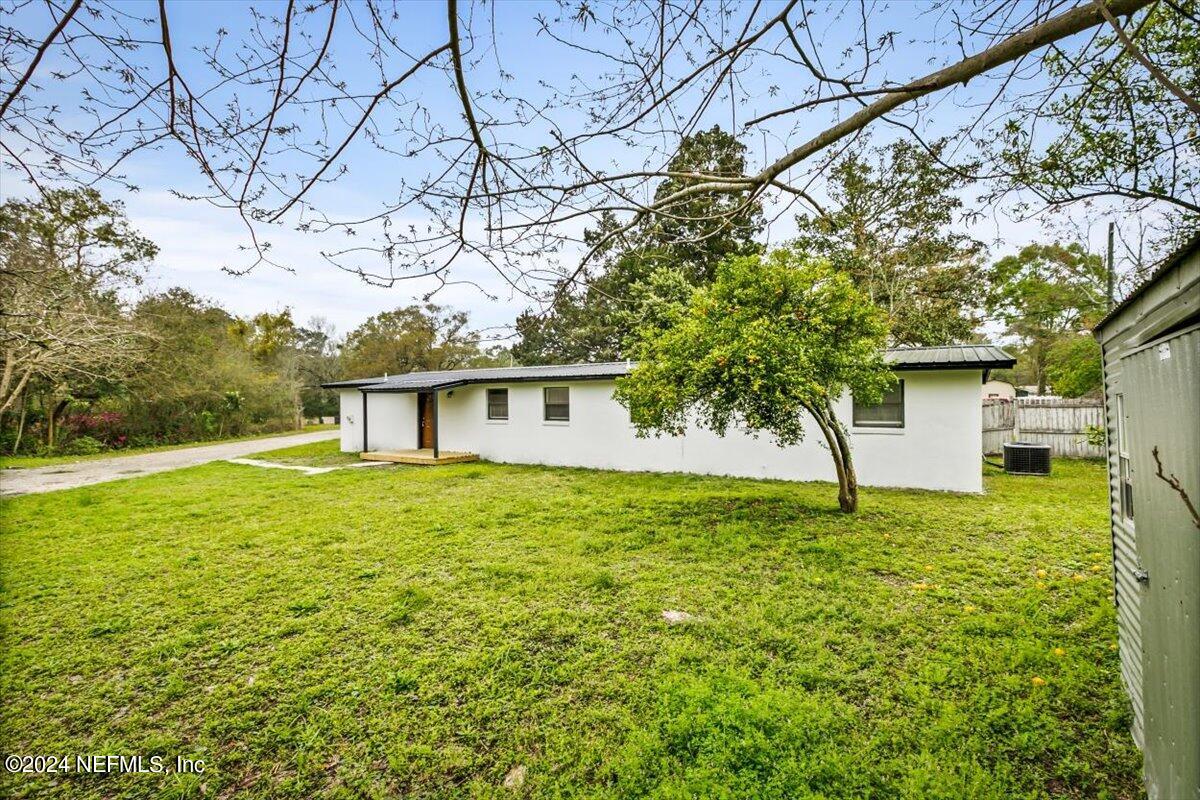 8264 Devoe Street Jacksonville, FL 32220 - Photo 23 of 24 a house view with a garden space