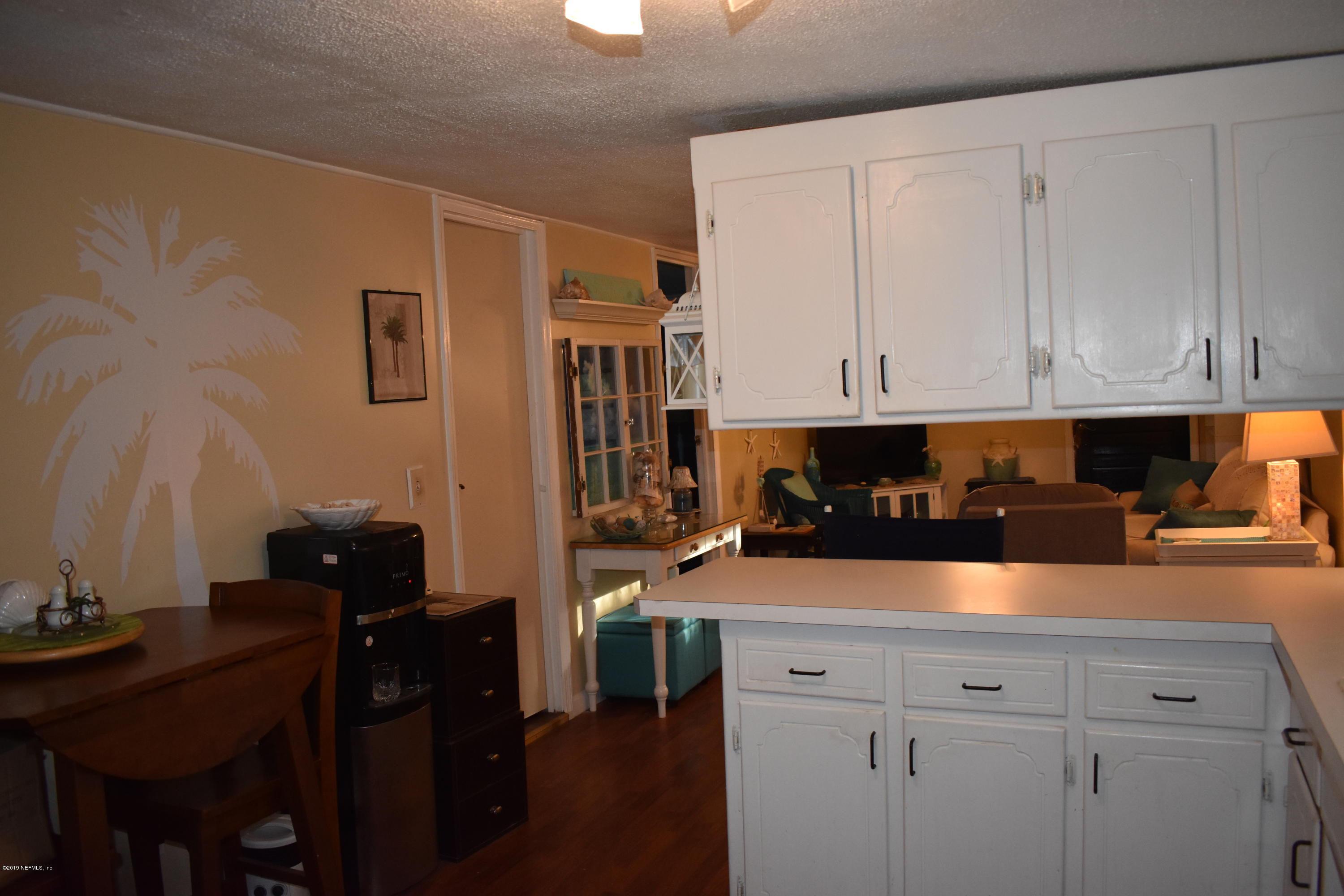 7854 Rusty Anchor Road St. Augustine, FL 32092 - Photo 8 of 12 Kitchen to Living Room