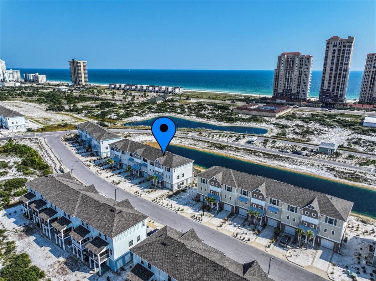 a view of a city with a ocean view