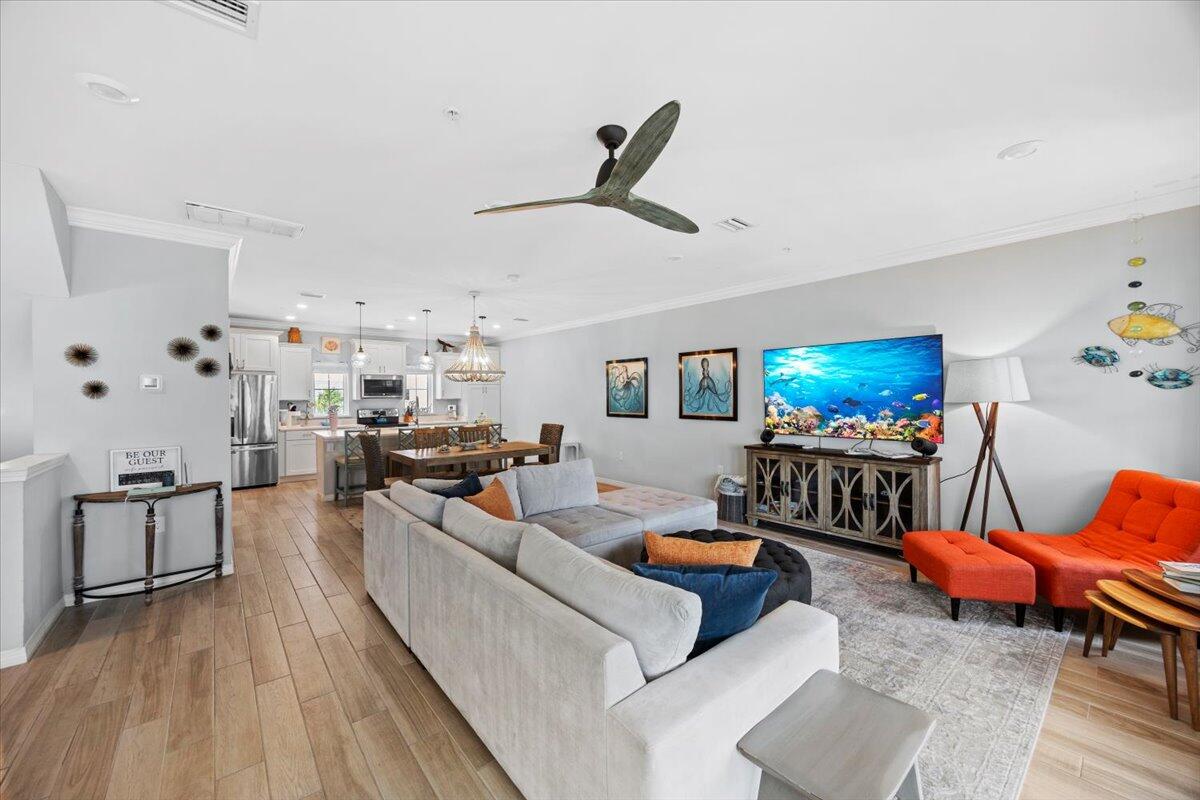 14241 Beach Heather Court Perdido Key, FL 32507 - Photo 16 of 39 a living room with furniture and a flat screen tv