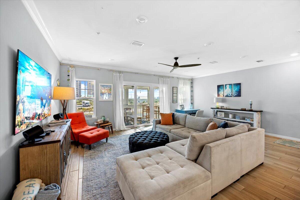 14241 Beach Heather Court Perdido Key, FL 32507 - Photo 17 of 39 a living room with furniture and a large window