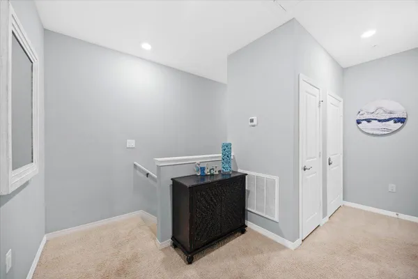 a view of storage and utility room with washer and dryer