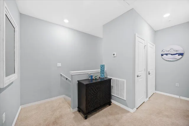a view of storage and utility room with washer and dryer