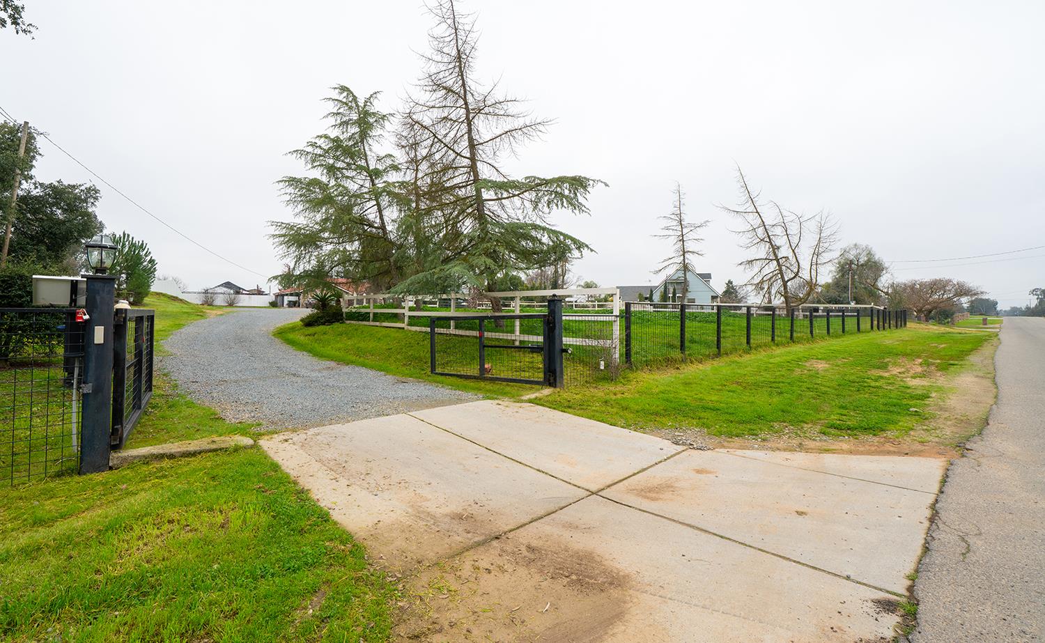 31144 James Avenue Madera, CA 93636 - Photo 3 of 45 a view of a park with large trees