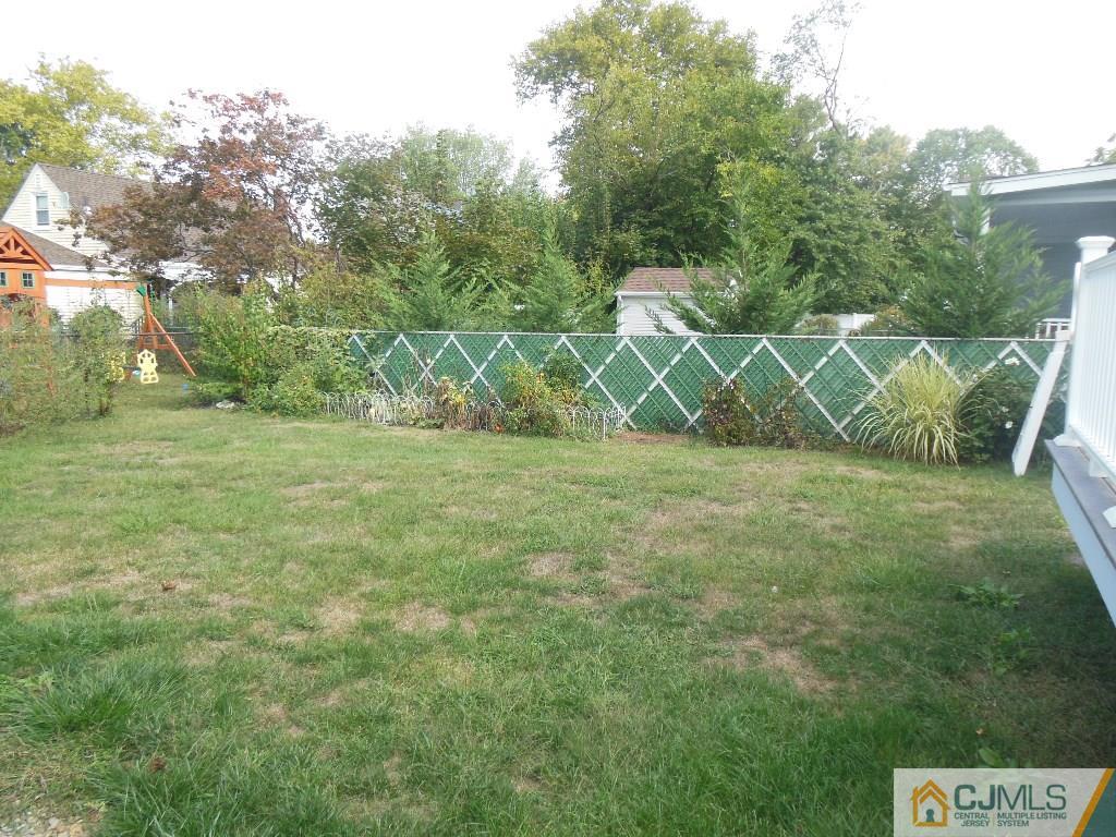 514 Fairway Road Linden, NJ 07036 - Photo 16 of 16 a backyard of a house with lots of green space