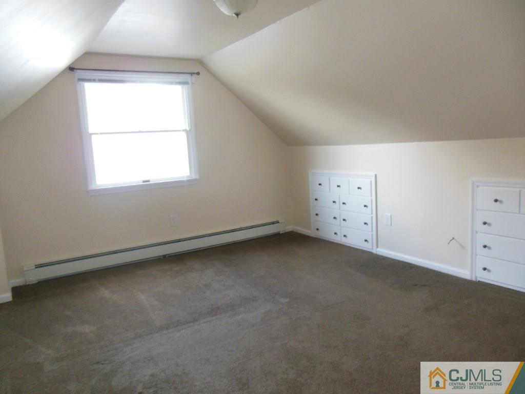 514 Fairway Road Linden, NJ 07036 - Photo 10 of 16 an empty room with a window