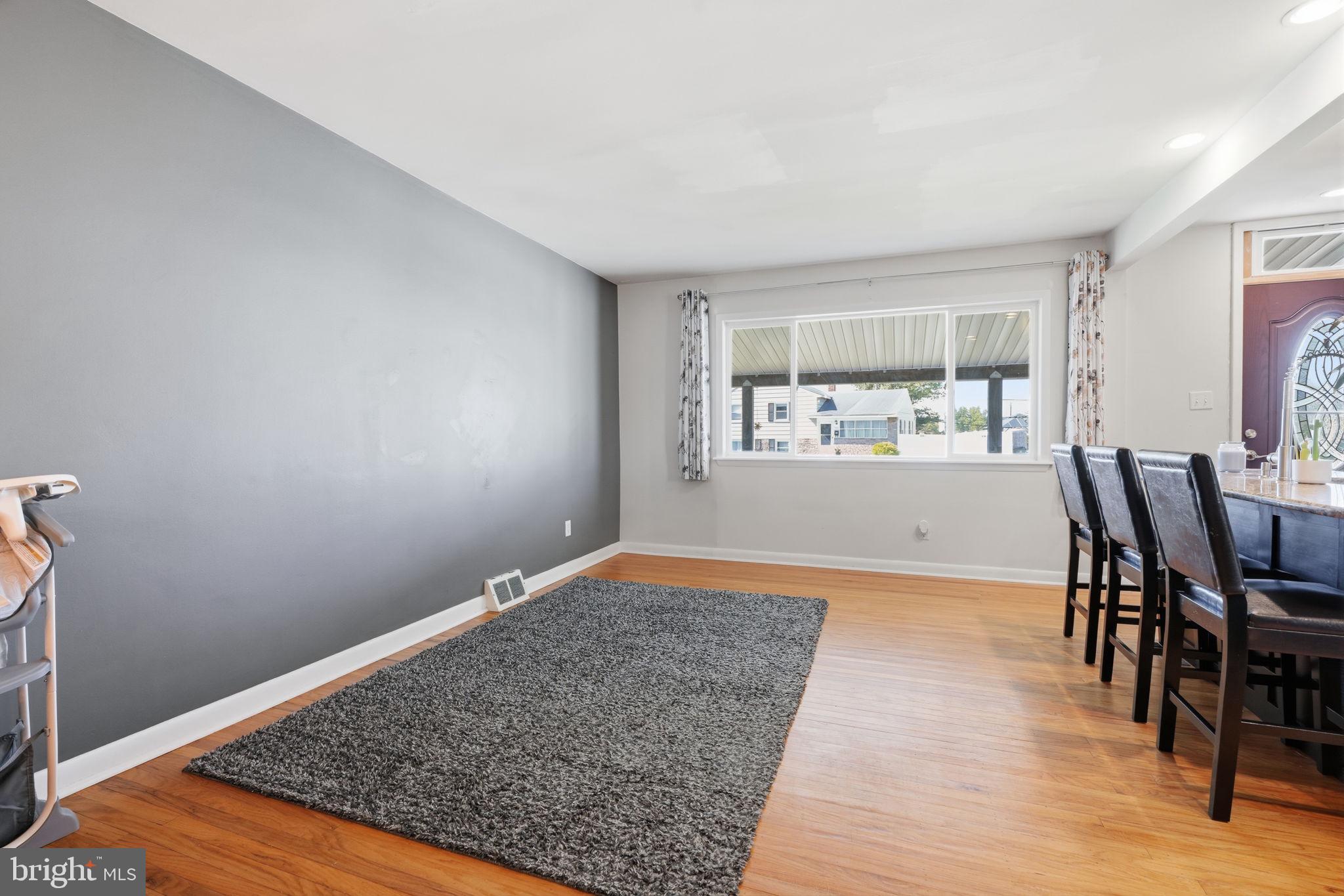 Spacious room with natural light.