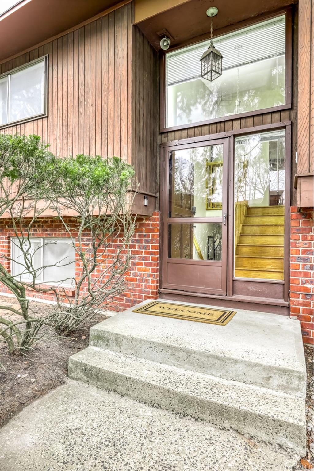 12 Woodwind Lane Spring Valley, NY 10977 - Photo 2 of 27 a view of a living room and entry gate