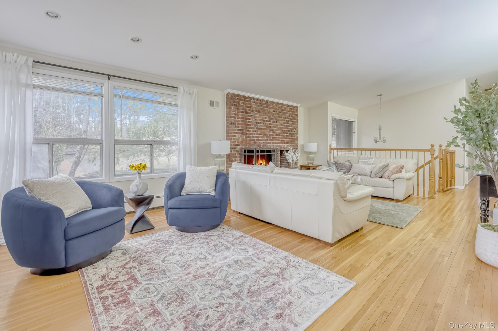 12 Woodwind Lane Spring Valley, NY 10977 - Photo 4 of 27 a living room with furniture and a large window