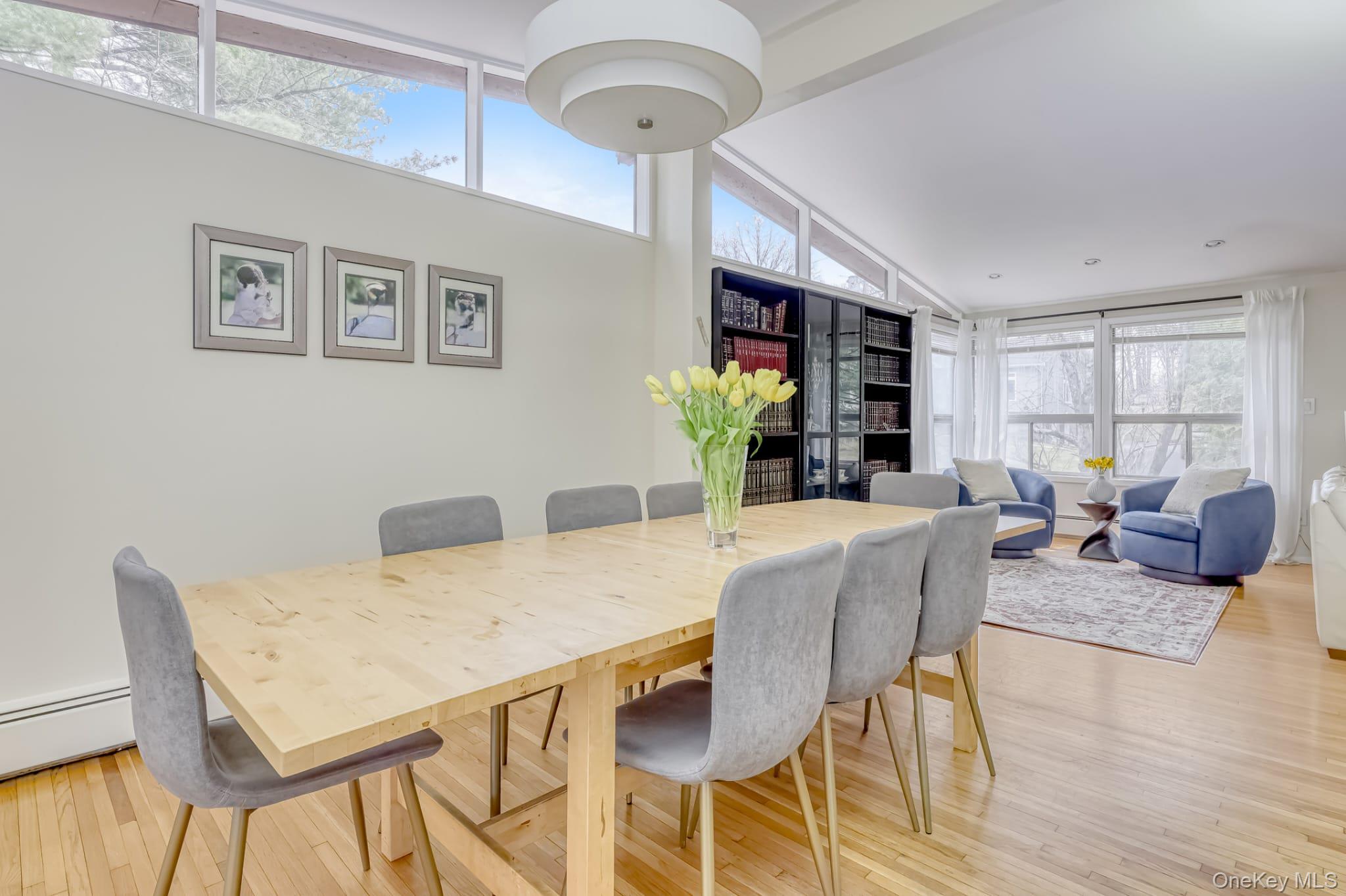 12 Woodwind Lane Spring Valley, NY 10977 - Photo 10 of 27 a view of a dining room with furniture window and wooden floor