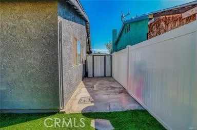 a view of a back yard of the house