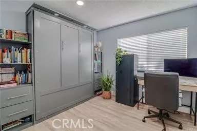 a workspace with furniture and closet