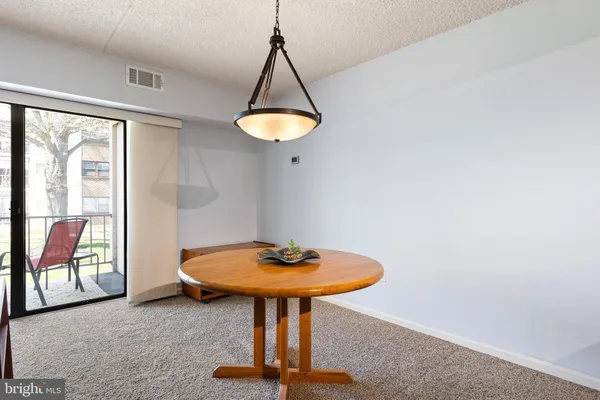 a view of a chandelier in a room