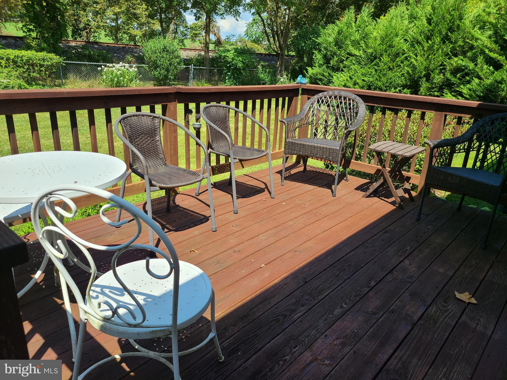 111 Valley Branch Drive Ranson, WV 25438 - Photo 22 of 26 Large deck on back of house overlooking backyard