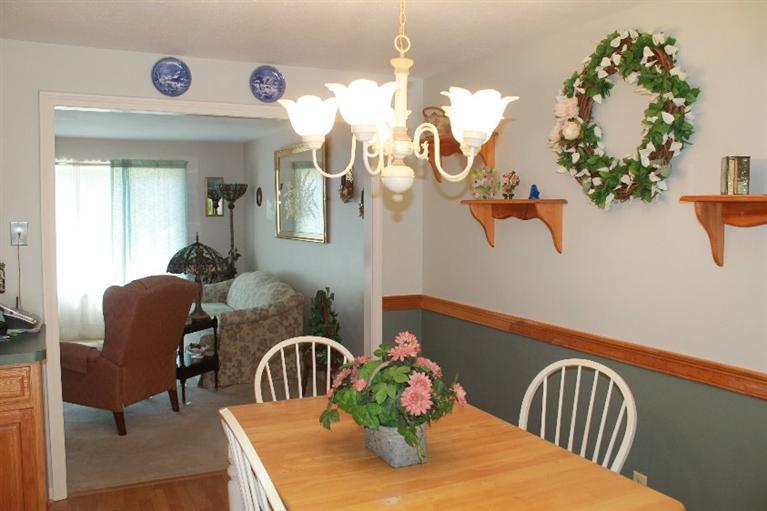 1344 Shootflying Hill Road Centerville, MA 02632 - Photo 5 of 18 a dining room with furniture and wooden floor