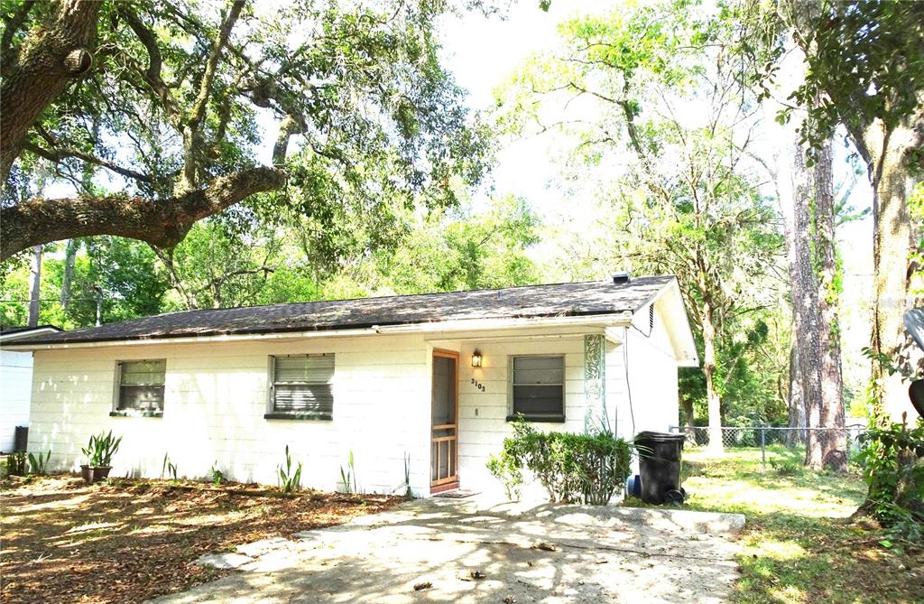 3103 Northwest 9th Street Gainesville, FL 32609 - Photo 1 of 1 a view of a house with a yard