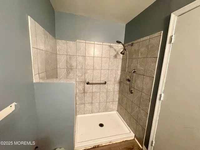 a bathroom with a bath tub