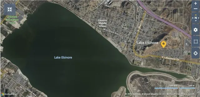 a water fountain in middle of a forest