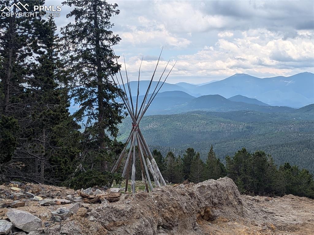 Upper Apex Road Idaho Springs, CO 80452 - Photo 11 of 25 a view of a lake with a mountain in the background