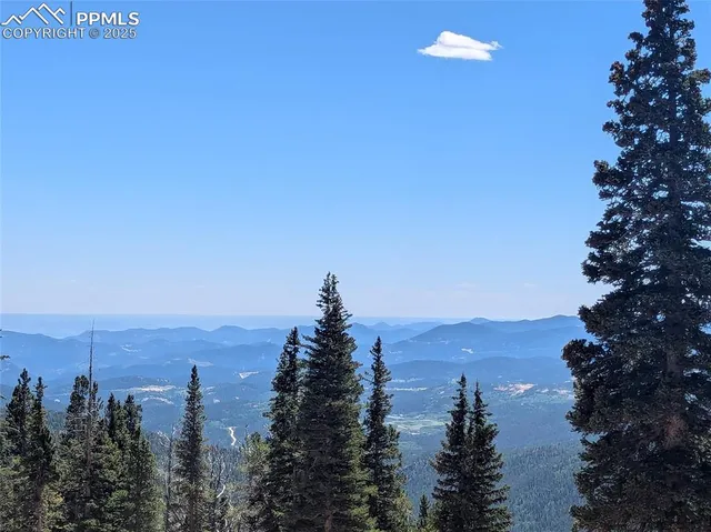 a view of lake and mountain