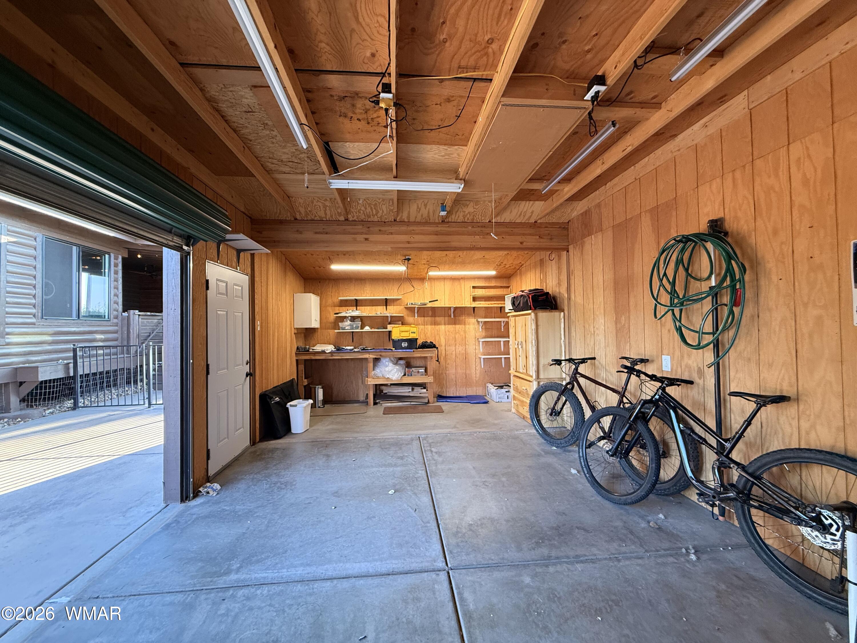 2334 Buffalo Loop Overgaard, AZ 85933 - Photo 19 of 25 a view of a room with gym equipment