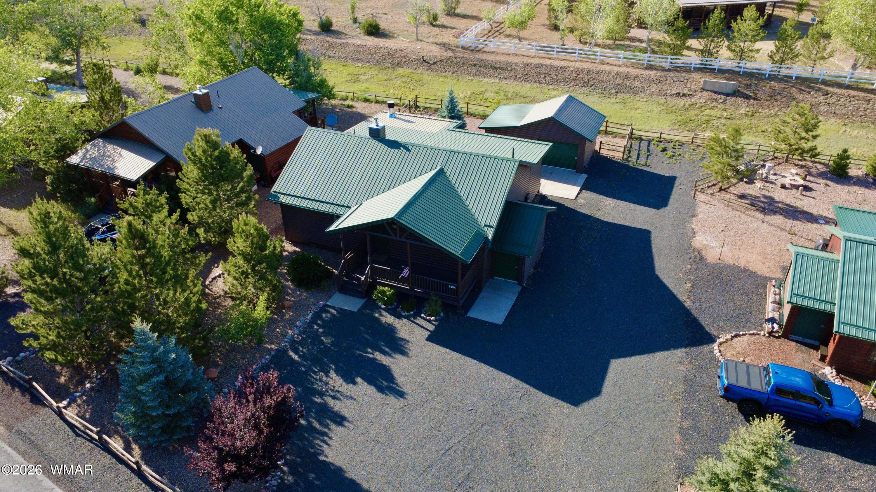 2334 Buffalo Loop Overgaard, AZ 85933 - Photo 2 of 25 a view of houses with an outdoor space