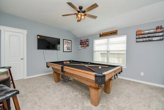 a room with furniture and window