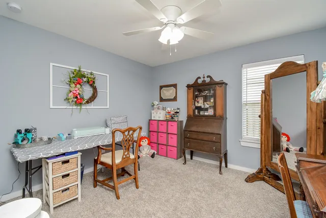 a bedroom with furniture and a bed