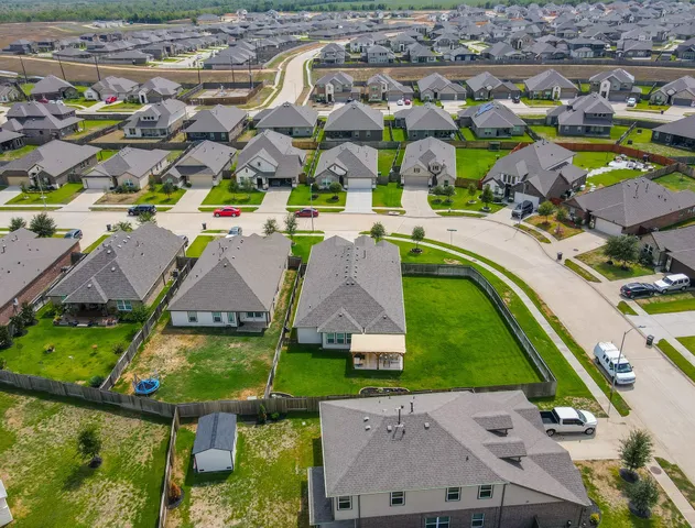 a view of a house with a big yard