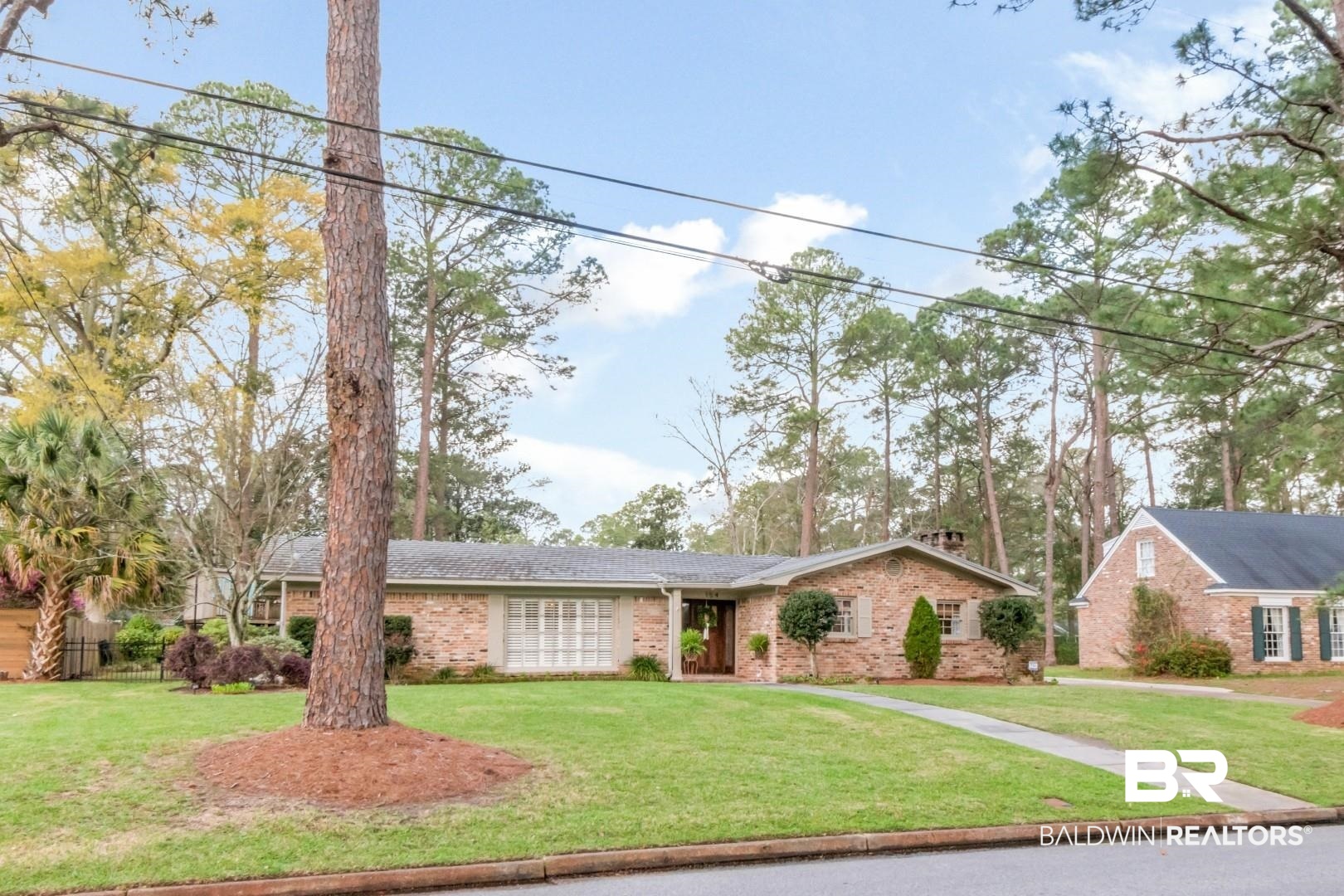 154 Fenwick Road Mobile, AL 36608 - Photo 42 of 48 Ranch-style home featuring a front lawn and brick siding