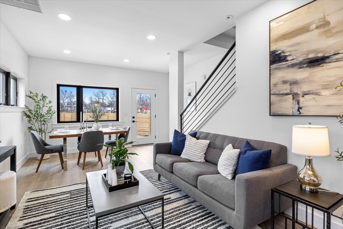 2406 West 10th Street, Unit A Austin, TX 78703 - Photo 2 of 13 a living room with furniture and a large window