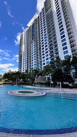 a front view of a building with outdoor space
