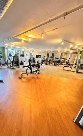 a view of a swimming pool with seating area