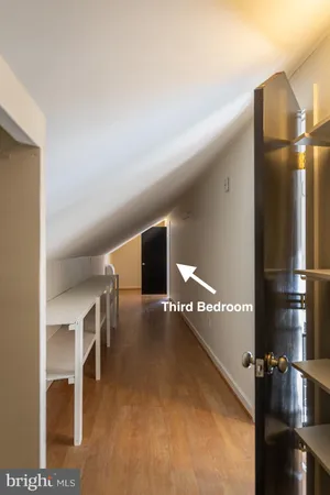 a view of a livingroom with wooden floor