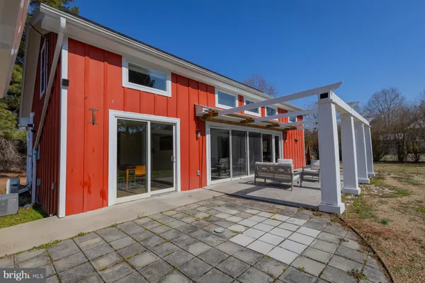 a view of a building with sitting area
