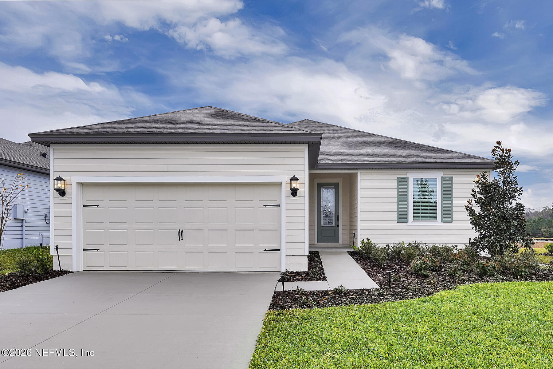 front view of house with a yard